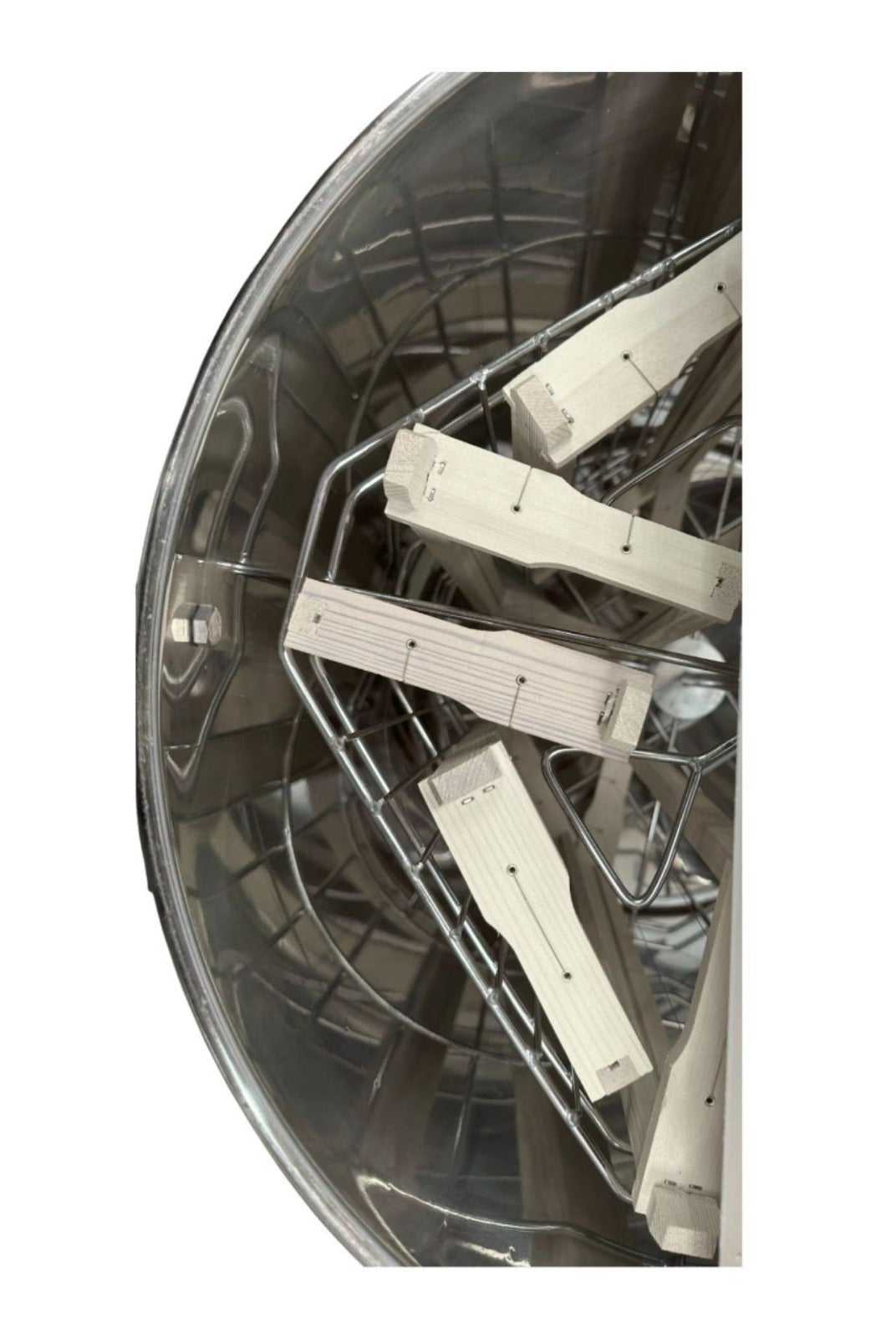 Close-up of OZ Armour honey extractor basket with wooden frame supports