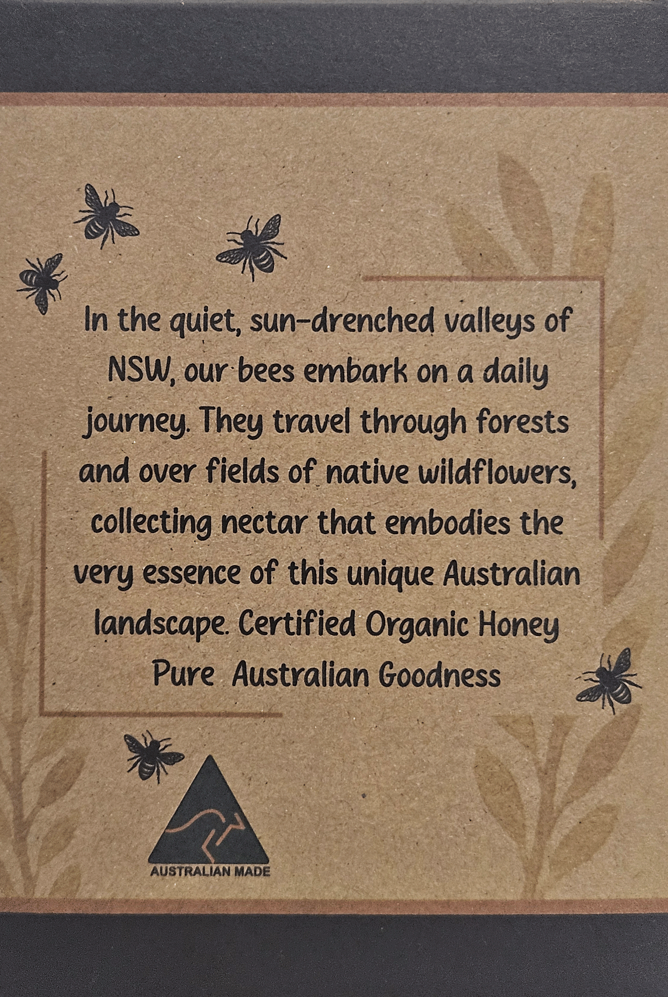 Back panel of organic honey packaging with brand story and Australian made logo