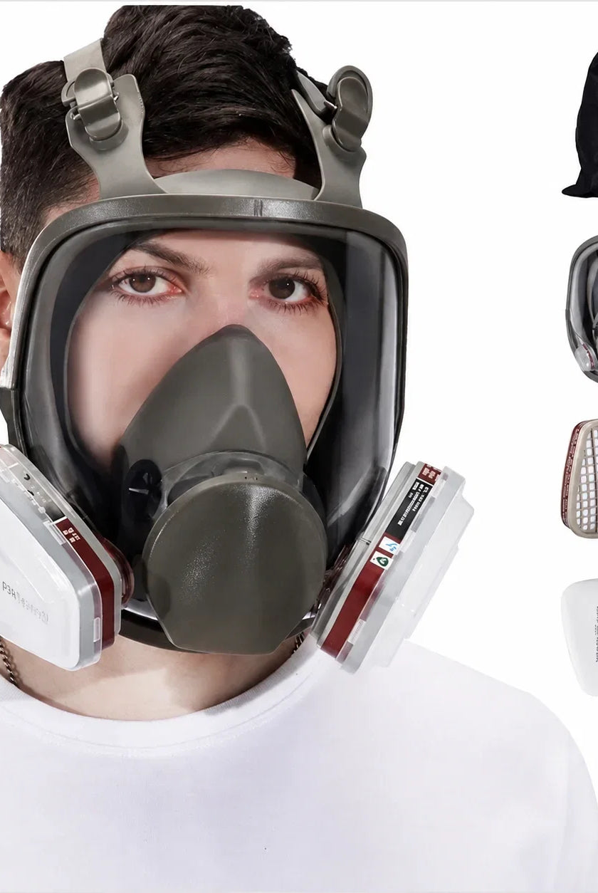 Man wearing full face respirator mask with acid gas cartridges and carry bag for oxalic acid vaporization