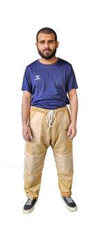 Man wearing a blue shirt and Khaki Beekeeping pant 