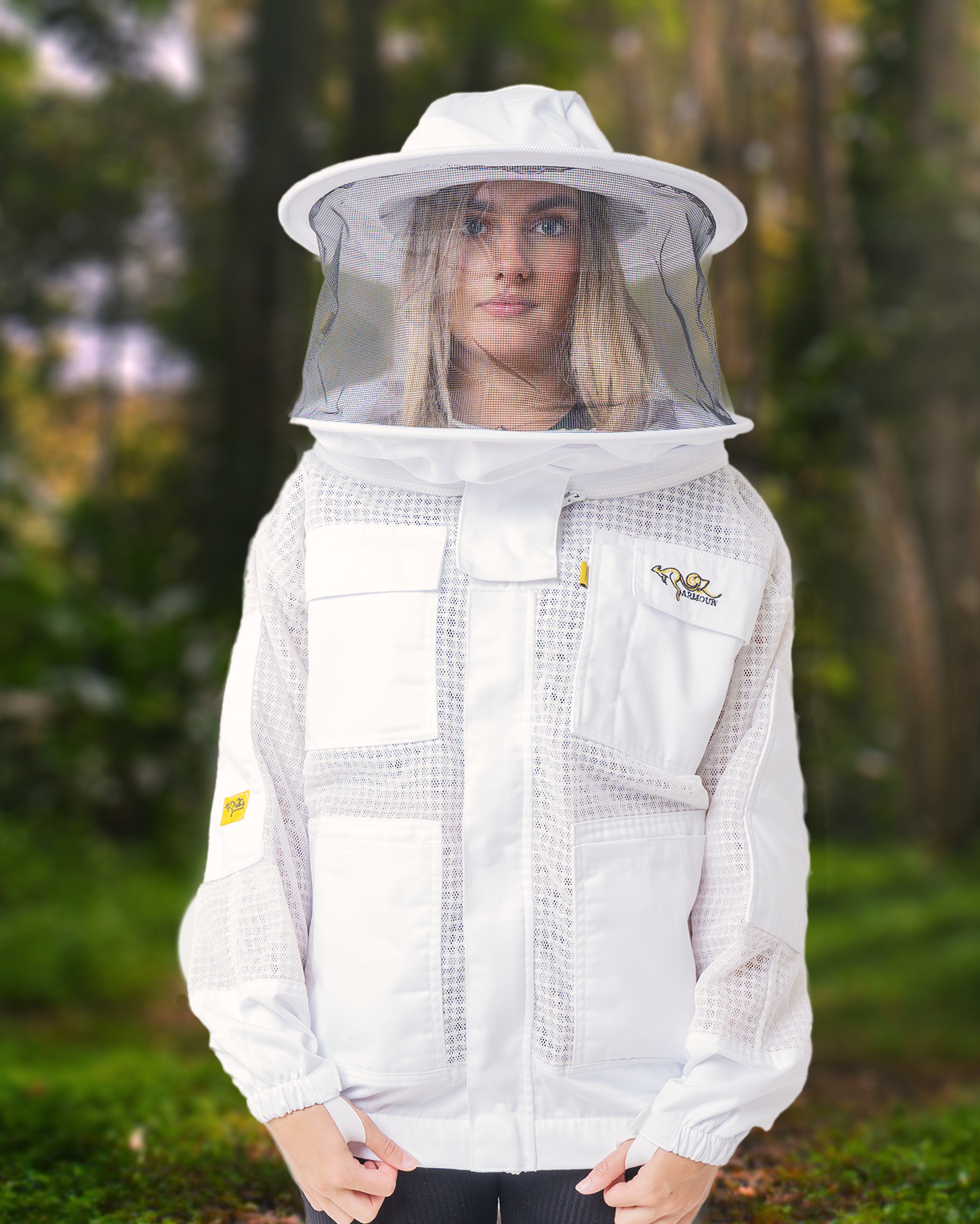A woman also wearing a beekeeping Jacket