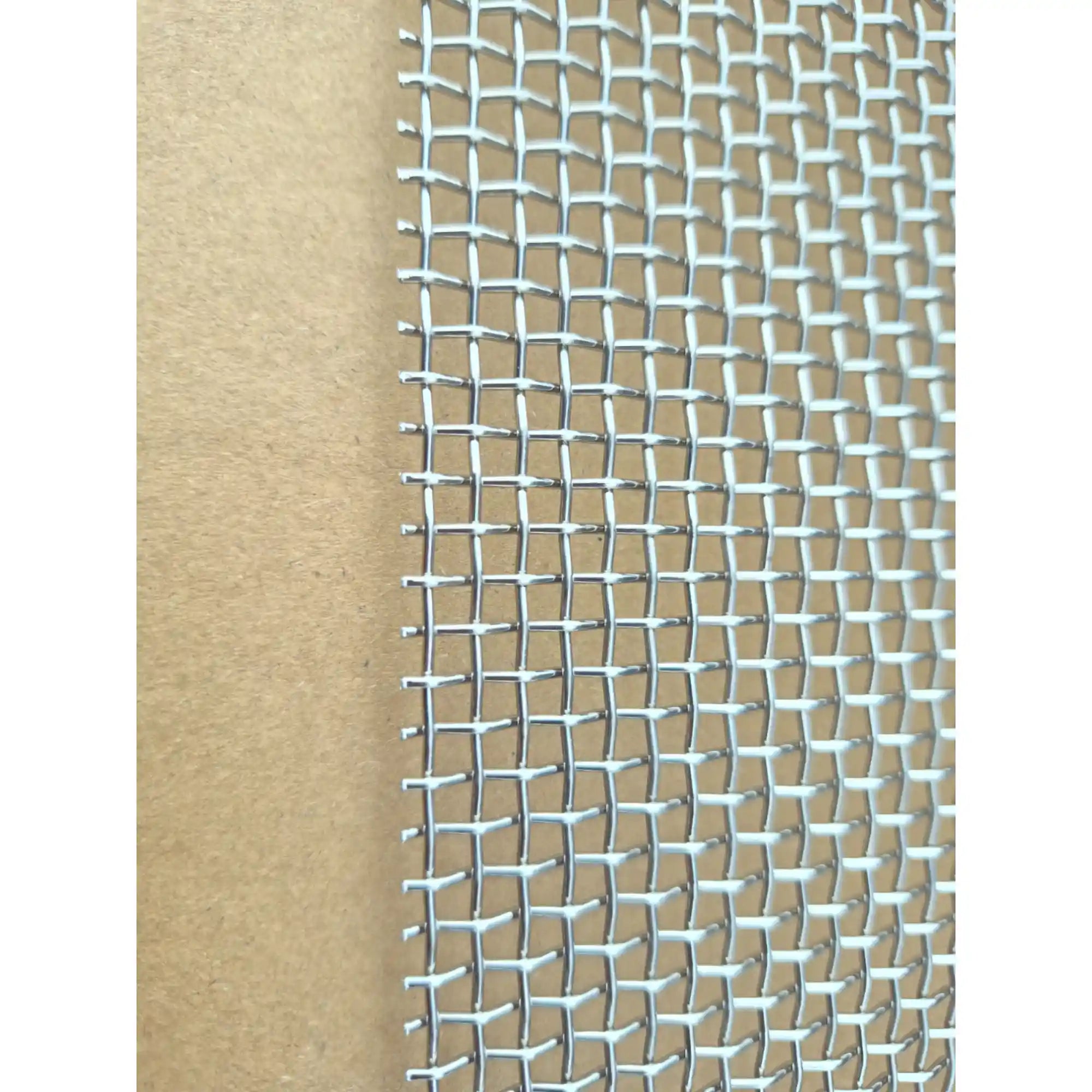 Close-up of stainless steel mesh weave for hive ventilation and beetle control
